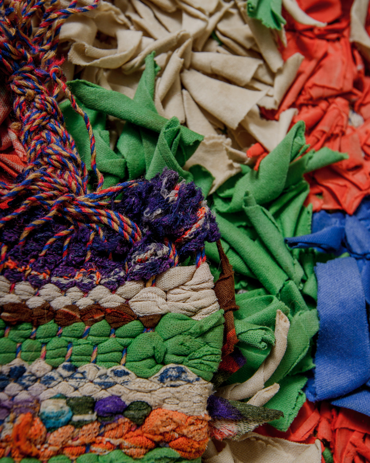 Close-up of colourful fabric scraps in various patterns and colors.